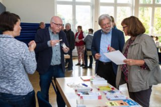 Auch nach den Vorträgen hatten die Schüler und Gäste noch viele Fragen an die Experten. Foto: SMMP/Bock